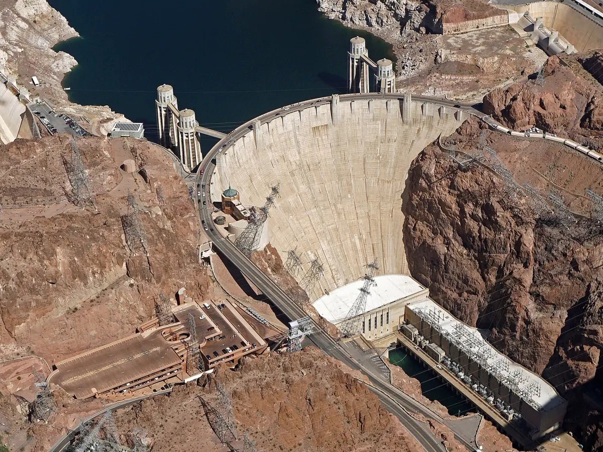 Aerial view of Hoover Dam with Lake Mead and the intake towers